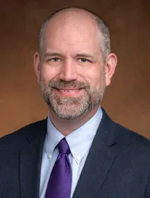 Portrait of Adam Schultz, Director, Pathways Implementation